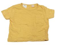 Šafránové tričko s kapsou Zara