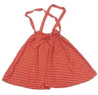 Červená vzorovaná sukně s kšandami a mašlí