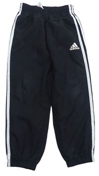 Černé šusťákové podšité kalhoty s logem Adidas