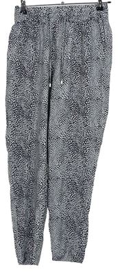 Dámské černo-bílé vzorované volné kalhoty M&S