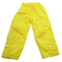 Žluté šusťákové kalhoty 