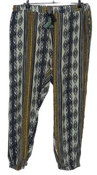 Dámské černo-béžovo-okrové vzorované volné kalhoty 
