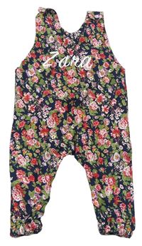 Tmavomodro-květované laclové kalhoty s nápisem
