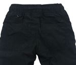 Černé šusťákové podšité kalhoty zn. C&A