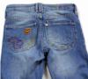 Modré riflové bootcut kalhoty s výšivkami 
