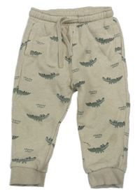 Smetanové tepláky s krokodýly 