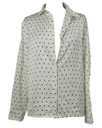 Dámská smetanovo-černá puntíkovaná halenka C&A