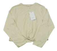 Nové - světlebéžové crop triko s uzlem name it.