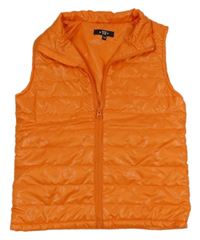 Oranžová šusťáková zateplená vesta zn. TEX