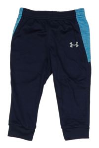 Tmavomodro-modré sportovní tepláky s logem Under Armour