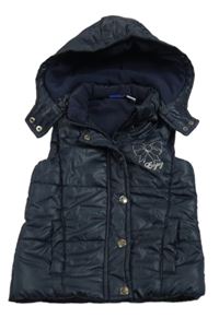 Tmavomodrá šusťáková prošívaná zateplená vesta s mašlí a odepínací kapucí Lupilu