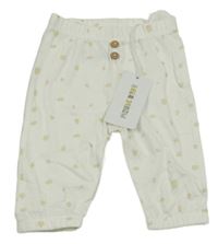 Nové - Smetanové tepláky se vzorem Maybe 