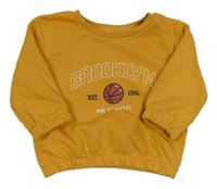 Hořčicová oversize mikina s míčem a nápisy Primark