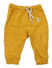 Hořčicové tepláky H&M