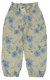 Světlebéžové květované volné kalhoty Tu