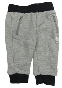 Šedo-černé tepláky s logem Adidas