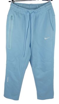 Pánské světlemodré tepláky Nocta Nike 
