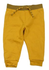 Žluté tepláky s proužkem Primark