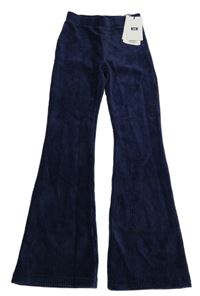 Nové - tmavomodré sametové žebrované flare legíny WE