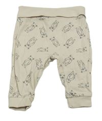 Béžové tepláky s medvědy Dopodopo