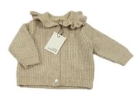 Nové - béžový třpytivý vlněný propínací svetr 