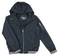 Tmavomodrá šusťáková lehce zateplená bunda s kapucí Nutmeg