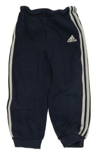 Tmavomodro-béžové tepláky s pruhy Adidas