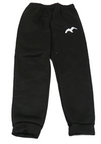 Černé sportovní kalhoty s ptákem