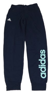 Tmavomodré tepláky s logem Adidas