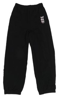 Černé sportovní kalhoty s mašličkami 