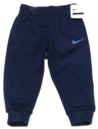 Tmavomodré funkční sportovní tepláky s logem zn. Nike