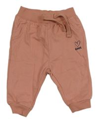 Růžové tepláky se srdcem 