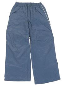 Modré šusťákové podšité kalhoty s výšivkou 