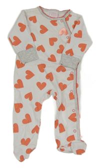 Bílý overal se srdíčky 