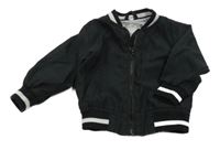 Černá šusťáková jarní bunda 