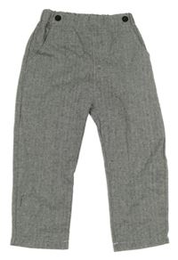 Černo-bílé plátěné kalhoty