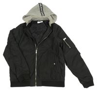 Černá šusťáková zateplená bunda s teplákovou kapucí H&M