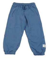 Modré tepláky s nášivkou Zara