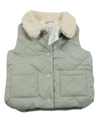 Nové - Zelenošedá šusťáková prošívaná zateplená vesta F&F