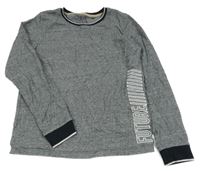 Černo-bílé proužkaté triko s nápisem Next