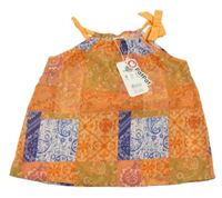 Nové - Oranžovo-barevný květovaný top 