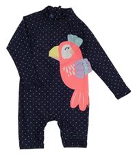 Tmavomodrý puntíkovaný UV overal s papouškem Topomini 