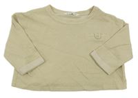 Béžovo-zlaté vzorované crop oversize triko s kapsou mango
