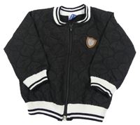 Černá prošívaná bunda s nášivkou