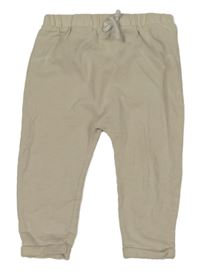 Béžové tepláky Tu