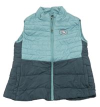 Modro-šedá šusťáková prošívaná zateplená vesta s nášivkou 