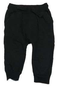 Černé tepláky Next