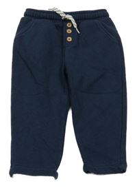 Tmavomodré tepláky s knoflíky