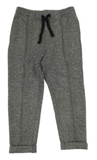 Černo-bílé vzorované teplákové kalhoty s puky H&M