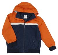 Tmavomodro-oranžová šusťáková zateplená bunda s kapucí Gémo